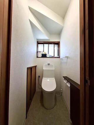 スタイリッシュで機能的なトイレ空間のアフター画像